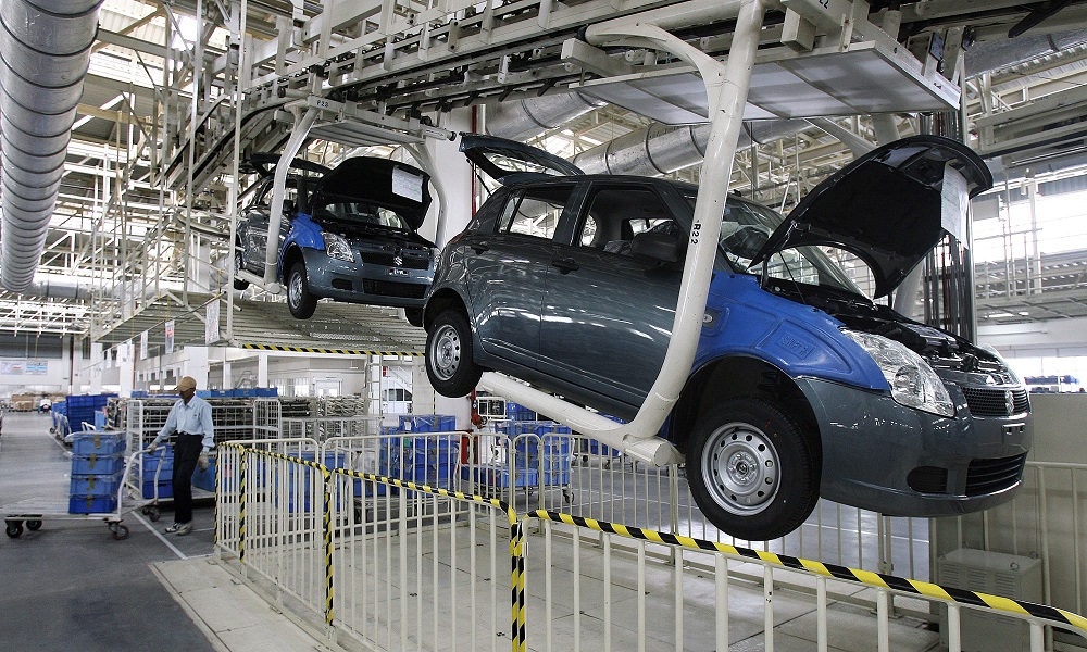 Maruti-Suzuki Swift cars roll off the assembly line at the new autoplant at Manesar in India's Haryana state some 50 kms South of New Delhi. (AFP/file)