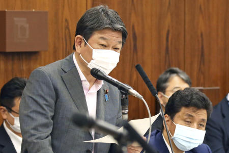 Japanese Foreign Minister Toshimitsu Motegi speaks during an upper house meeting at parliament in Tokyo, Tuesday, May 25, 2021. (AP)