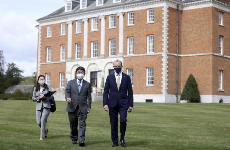 Britain's Foreign Secretary Dominic Raab (right), walks with Japan's Foreign Minister Toshimitsu Motegi (centre), during their talks in Kent, southern England, on Monday, May 3, 2021. (AP)