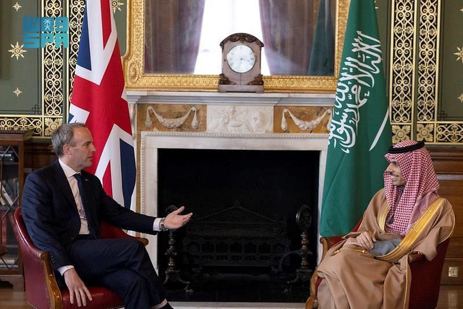 Prince Faisal bin Farhan meets with Dominic Raab in London on Wednesday. (SPA)