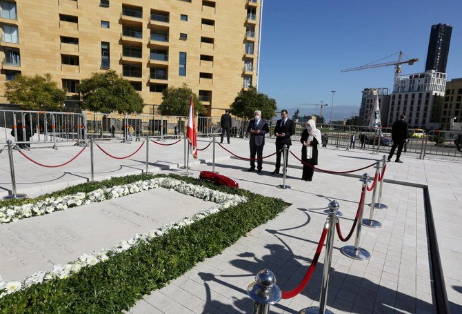 Lebanese Prime Minister-designate Saad al-Hariri and his aunt Bahiya al-Hariri pray at Rafik Hariri’s grave on his assassination’s 16th anniversary. UN tribunal for Lebanon has run out of funds amid Lebanon’s crisis. (Reuters)