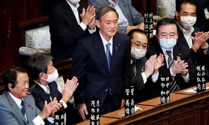 Japan’s newly-elected Prime Minister Yoshihide Suga is acknowledged by the Lower House of Parliament in Tokyo, Japan, September 16, 2020. (Reuters)