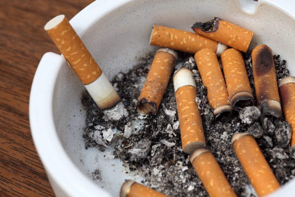 Cigarettes cost only around 450 ($4) to 570 yen a pack and carry modest health warning labels. (Shutterstock)