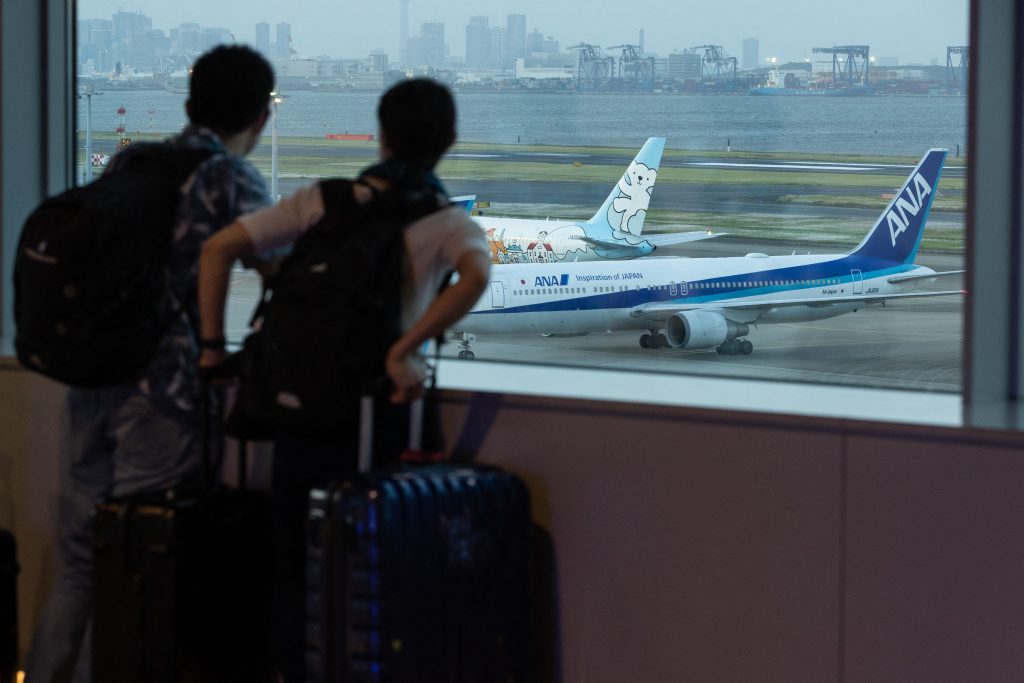 Japan said it will make a vaccine passport available from next month for Japanese travellers. (AFP)
