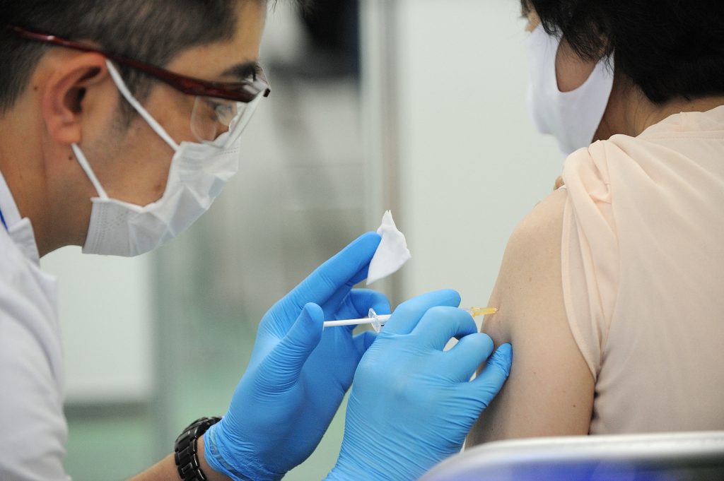 Some universities are working together in local areas to carry out inoculations. (AFP)