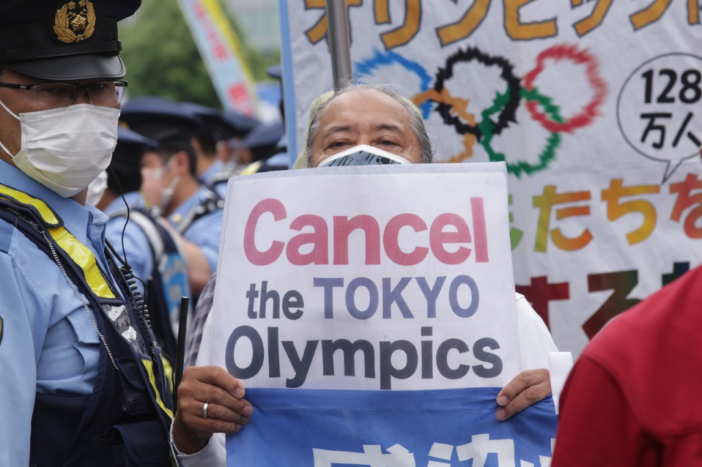 More than 300 Japanese marched through the streets of Tokyo on Sunday to protest the government’s decision to go ahead with the Olympic Games. (ANJ photos)