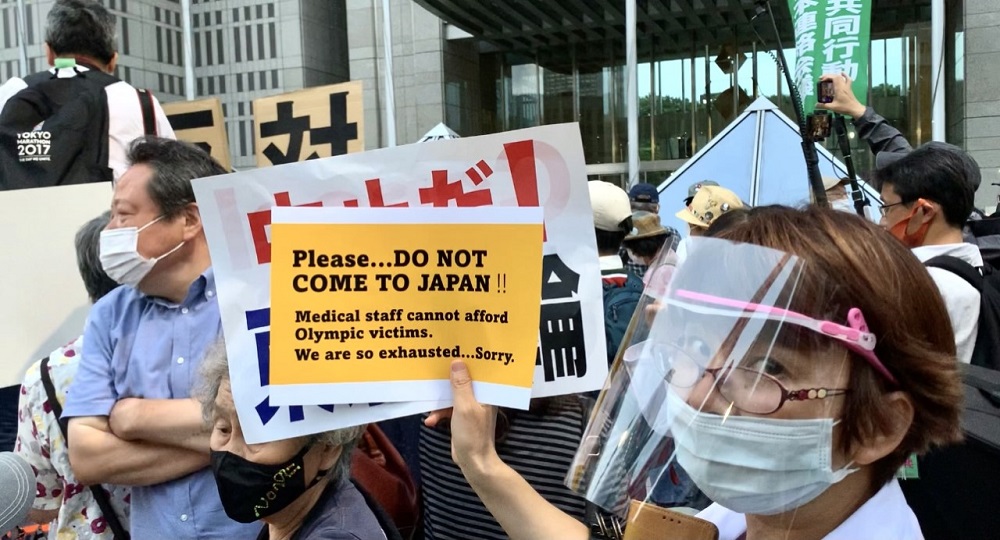 An estimated 850 Japanese gathered before the Metropolitan Government Building to send the world a message that came as no surprise: