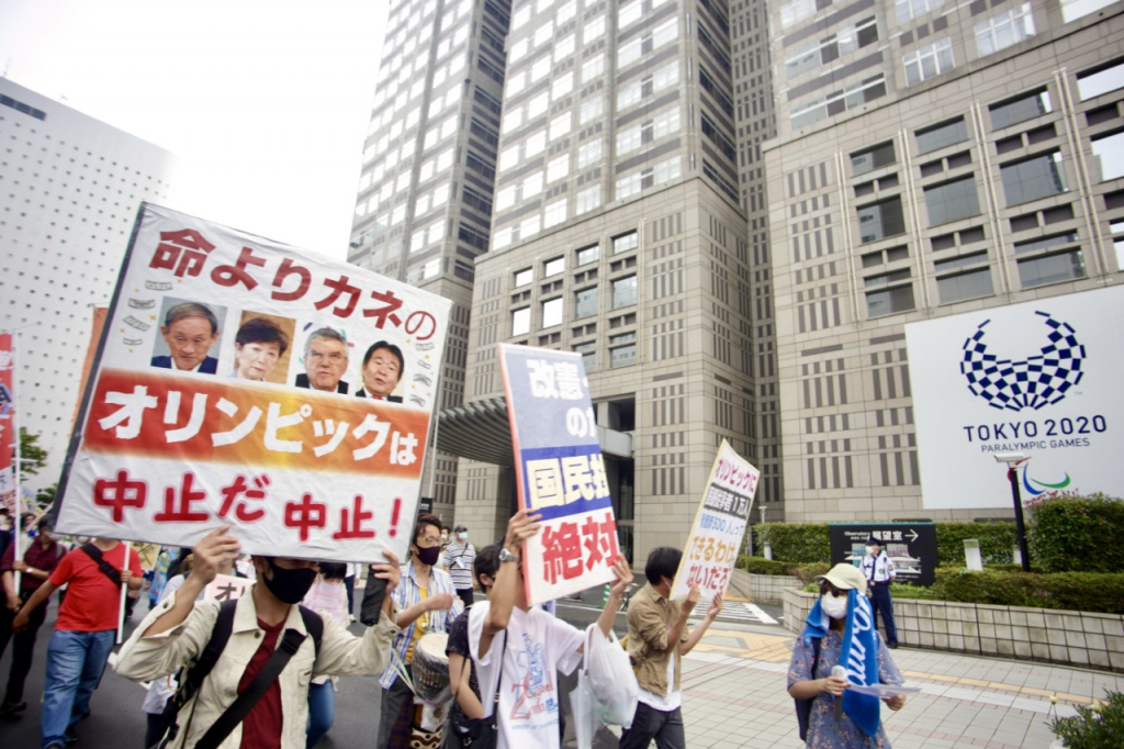 More than 300 Japanese marched through the streets of Tokyo on Sunday to protest the government’s decision to go ahead with the Olympic Games. (ANJ photos)