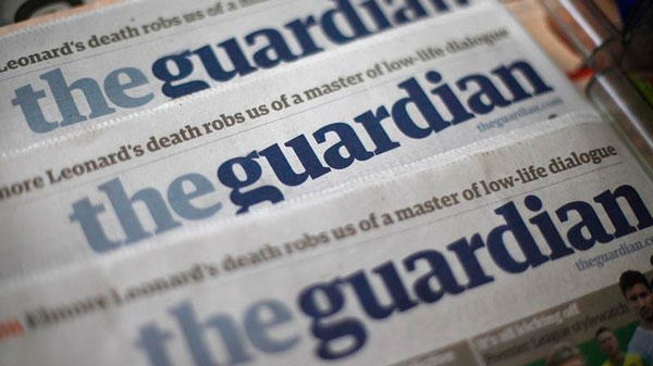 Copies of the Guardian newspaper are displayed at a news agent in London August 21, 2013. (Reuters)