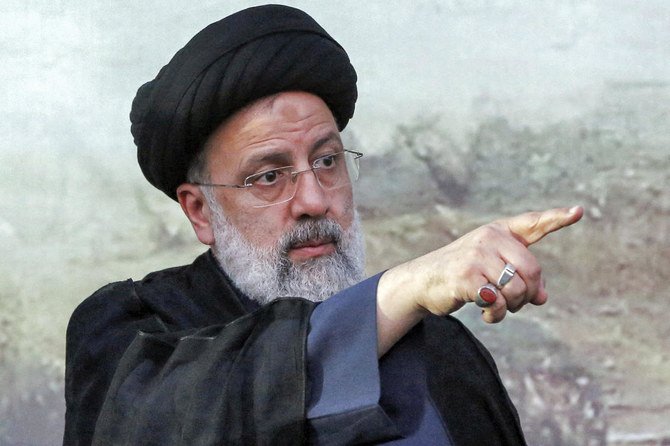 In this file photo taken on June 06, 2021 Iranian presidential candidate Ebrahim Raisi gestures during an election campaign rally in the city of Eslamshahr. (AFP)