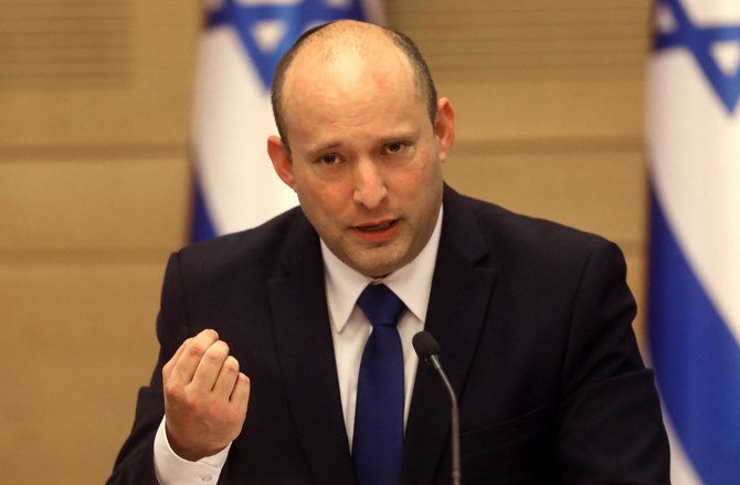 Israel’s new prime minister Naftali Bennett gives an address before the new cabinet at the Knesset in Jerusalem. (File/AFP)
