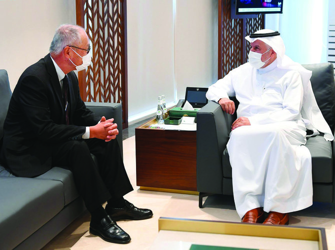 Dr. Abdullah Al-Rabeea, right, receives Japanese Ambassador Iwai Fumio in his office in Riyadh. (SPA)