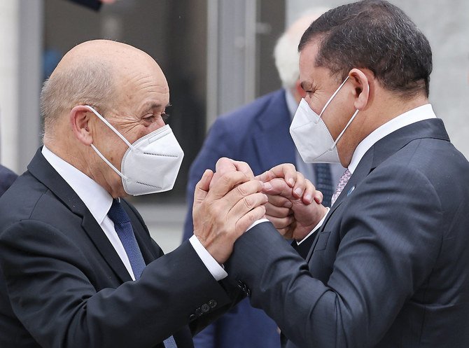 French Foreign Minister Jean-Yves Le Drian and Libyan Prime Minister Abdulhamid Mohammed Dbeiba at Wednesday’s Libya conference in Berlin. (GettyImages)/AFP)