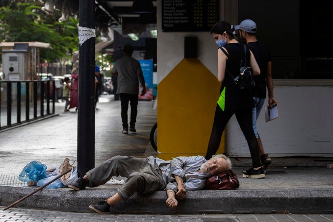 With virtually no national welfare system, Lebanon's elderly are left to fend for themselves amid their country's economic turmoil. (AP Photo/Hassan Ammar)