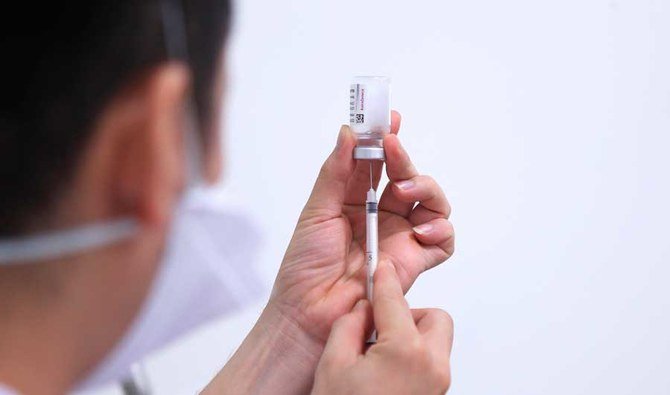 More than 17.4 million vaccine doses have been administered at 587 vaccine centers across 13 regions of Saudi Arabia. (AP)