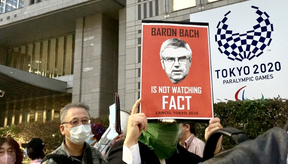 An estimated 850 Japanese gathered before the Metropolitan Government Building to send the world a message that came as no surprise: