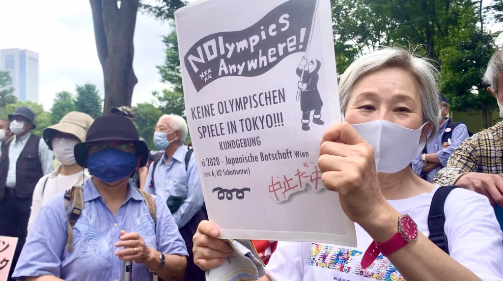 More than 300 Japanese marched through the streets of Tokyo on Sunday to protest the government’s decision to go ahead with the Olympic Games. (ANJ photos)