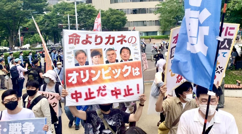 More than 300 Japanese marched through the streets of Tokyo on Sunday to protest the government’s decision to go ahead with the Olympic Games. (ANJ photos)
