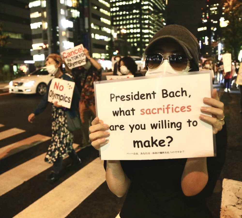 An estimated 850 Japanese gathered before the Metropolitan Government Building to send the world a message that came as no surprise: