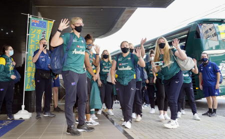 Members of Australia's Olympic softball team wave upon their arrival at a hotel in Ota, Gunma Prefecture, Japan, where they have a training camp in this photo taken by Kyodo June 1, 2021. (Reuters)