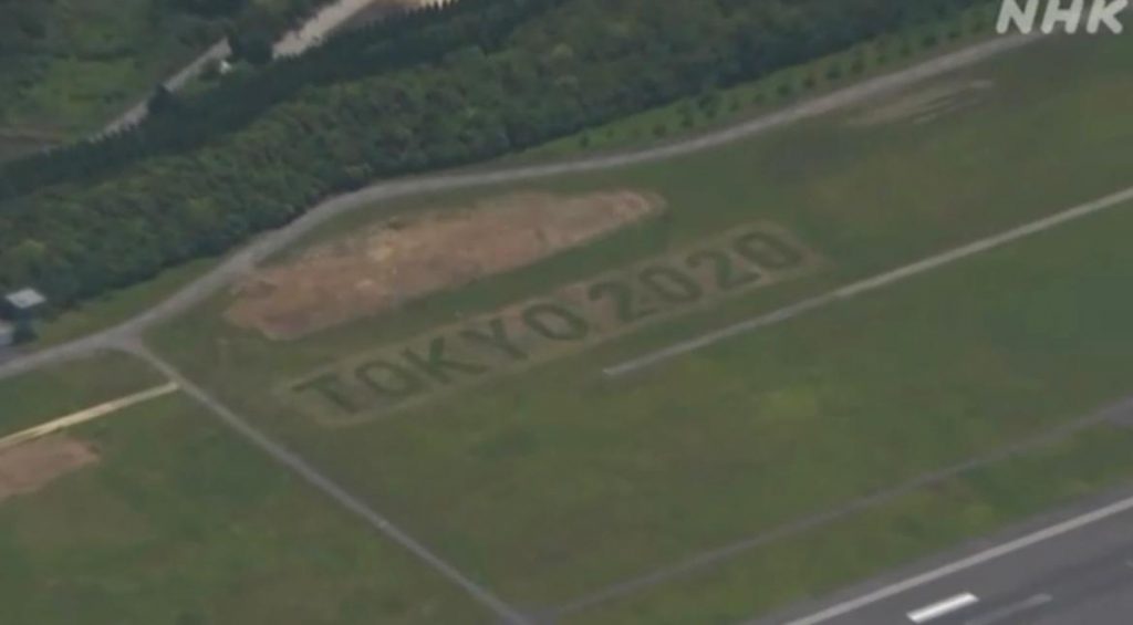 The message was cut into the grass on both the west side of Runway A and the east side of Runway B. (Screengrab)