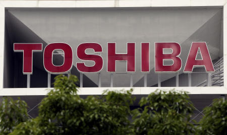 This May 26, 2017, file photo shows the company logo of Toshiba Corp. displayed in front of its headquarters in Tokyo. (AP)