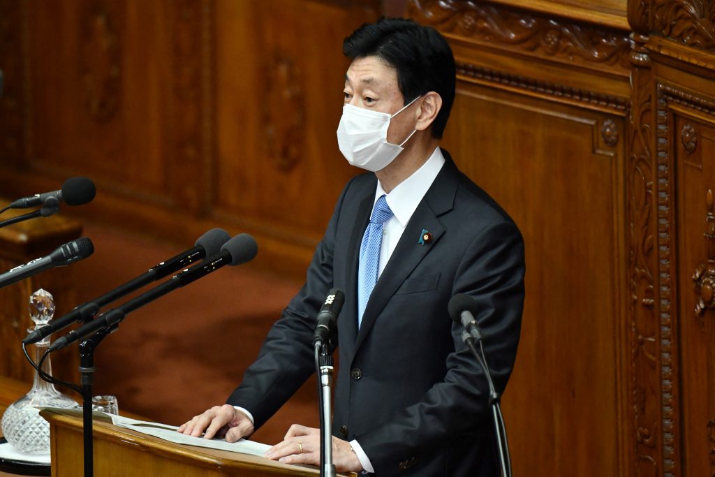 Japan's economy minister Yasutoshi Nishimura caused an uproar last week after suggesting that banks put pressure on restaurants and bars which defy the government's lockdown measures. (AFP)