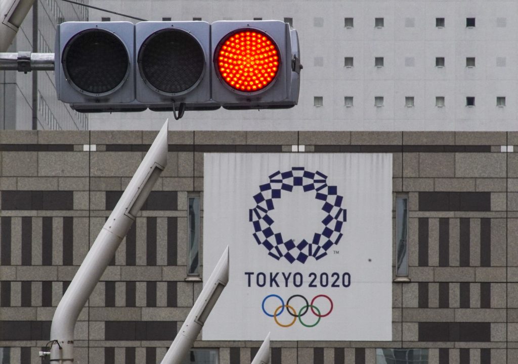 The organizing committee said three other contract workers, all residents of Japan, have newly tested positive for the virus. (AFP)