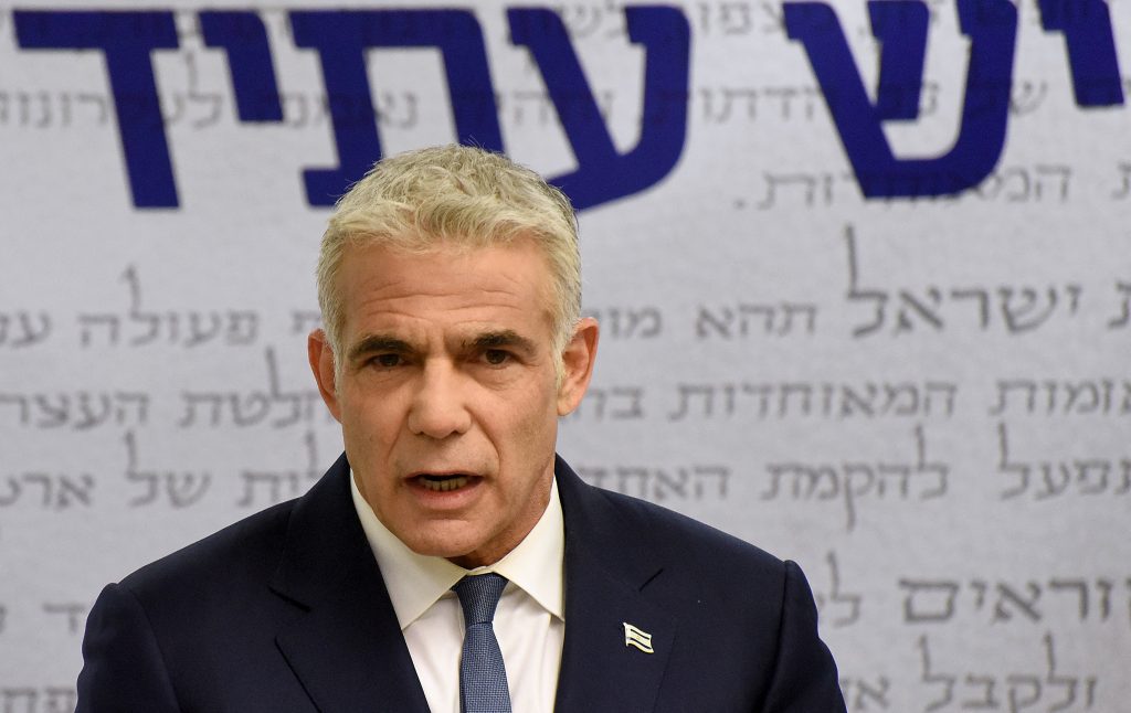 Israel's centrist opposition leader Yair Lapid delivers a statement to the press at the Knesset (Israeli parliament) in Jerusalem on May 31, 2021. (AFP)