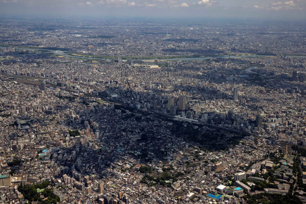 The shift to electricity derived from sources that do not emit carbon dioxide when generating power will help households and offices greatly reduce greenhouse gas emissions. (AFP)