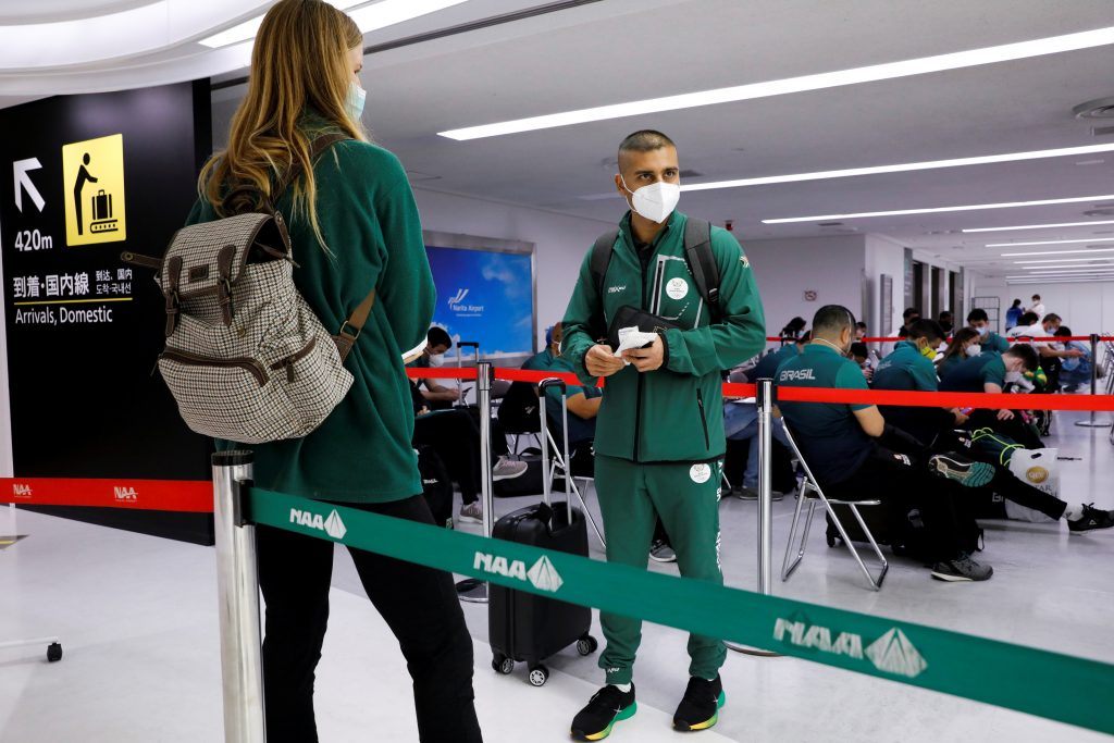Members of South Africa team wait to be tested for a coronavirus disease (COVID-19) at Narita international airport ahead of Tokyo 2020 Olympic Games in Narita, east of Tokyo, Japan July 17, 2021. (File photo/Reuters)