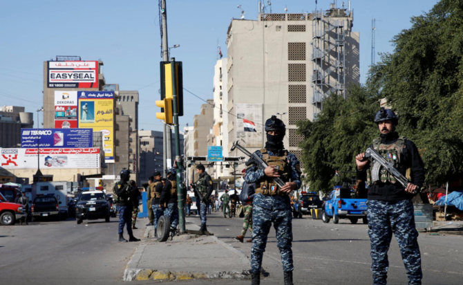 Guards at the site of a twin suicide bombing attack in a central market in Baghdad back in January. Iraqi security officials said an explosion struck a busy market in Baghdad Wednesday, wounding over nine people. (Reuters/File Photo)