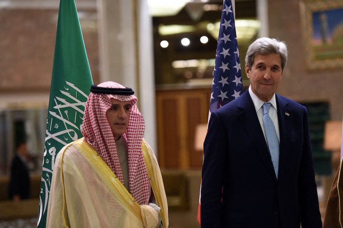 US Secretary of State John Kerry talks to Saudi Minister of Foreign Affairs Adel Al-Jubeir as they arrive for a family picture in Riyadh. (File/AFP)