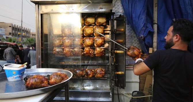 Restaurant and cafe owners were among the 65 percent of small and medium-sized businesses in Iraq that saw their revenues plummet during a spring lockdown last year. (AFP)