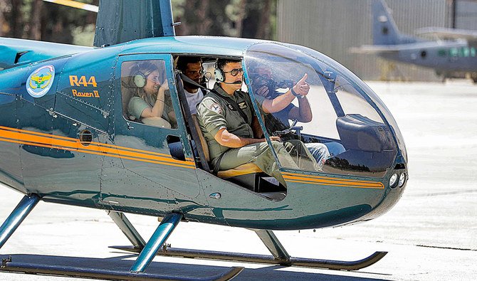 A Lebanese Air Force Robinson R44 Raven II helicopter takes off with journalists from Rayaq military air base in the Bekaa Valley during a press tour. (AFP)