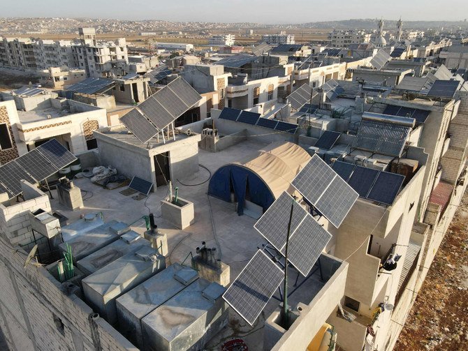 Solar panels are seen on the rooftops of buildings in the town of Dana, Idlib province, Syria, on June 10, 2021. (AFP / Aaref Watad)