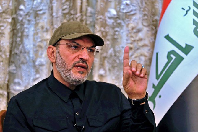 Abu Alaa Al-Walae, commander of Kataib Sayyid Al-Shuhadam, was once held prisoner by US troops in Iraq. (AP)
