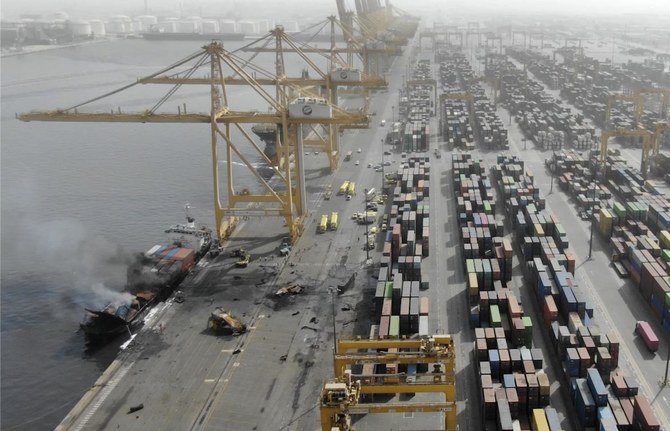 The smoke from container ship Ocean Trader can be seen on Thursday, July 8, 2021 after there was an explosion on Wednesday night. (AP)