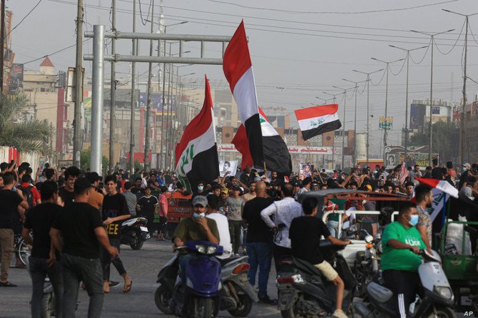 Iraqis rally outside the provincial council building in Basra, Iraq, on May 25, 2021 to protest power cuts. (AP file)