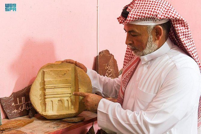 Husban bin Ahmad Al-Enizi used Ottoman calligraphy to create his Qur’an sculpture on green marble slabs. (SPA)