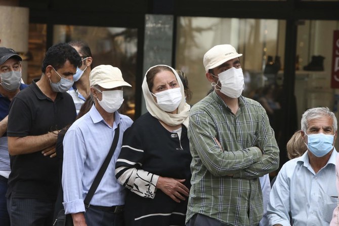 People stand in line for a coronavirus vaccine shot at a mobile vaccination station in the center of in Yerevan, Armenia, Wednesday, July 14, 2021. (Vahram Baghdasaryan/AP)