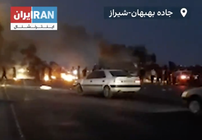 Protesters start fires on the highway from Behbahan, Khuzestan, as protests against a lack of water spread. (Screengrab from Iran International)