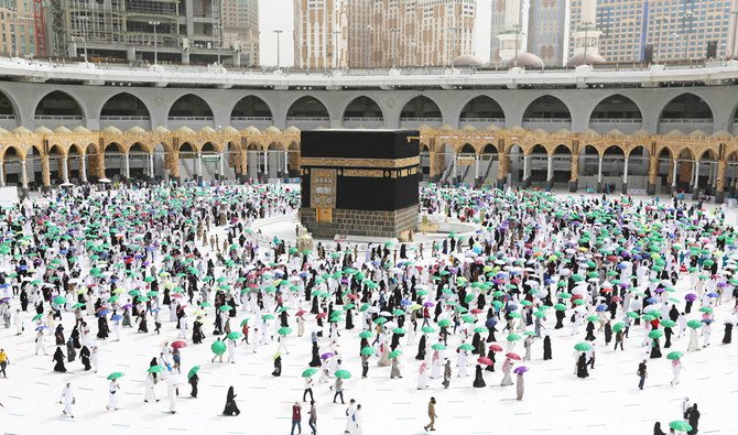 Worshippers perform the farewell tawaf (circumambulation) around the Kaaba at the Grand mosque in Makkah on July 22, 2021, marking the end of this year's Hajj. (AFP)