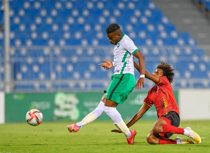 Salem Al-Dawsari, one of the Saudi Olympic team’s ‘overage’ players, in action against Uganda. (Twitter: @SaudiNT)