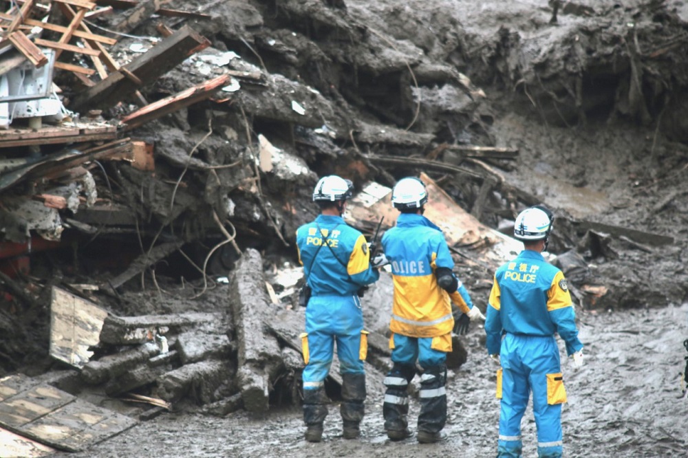 Firefighters, police and self-defense forces are being used to clear the debris and search for survivors.(ANJ/Pierre Boutier)