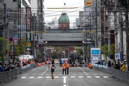 This file photo taken on May 5, 2021 shows athletes competing in the half-marathon race which doubles as a test event for the 2020 Tokyo Olympics in Sapporo. (AFP)