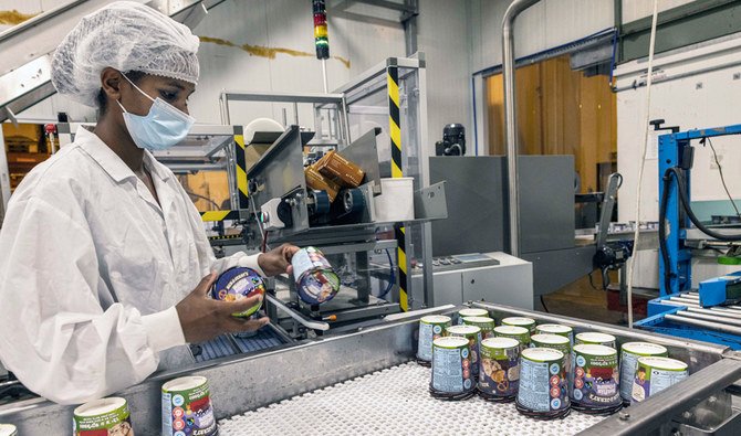 An Israeli works at the Ben & Jerry's ice-cream factory in the Be'er Tuvia Industrial area, Tuesday, July 20, 2021. (AP)