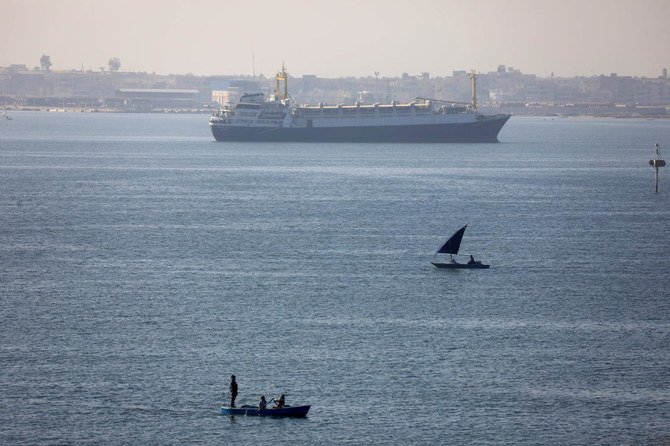 A ship is seen after passing through the Suez Canal in Ismailia, Egypt. (Reuters)