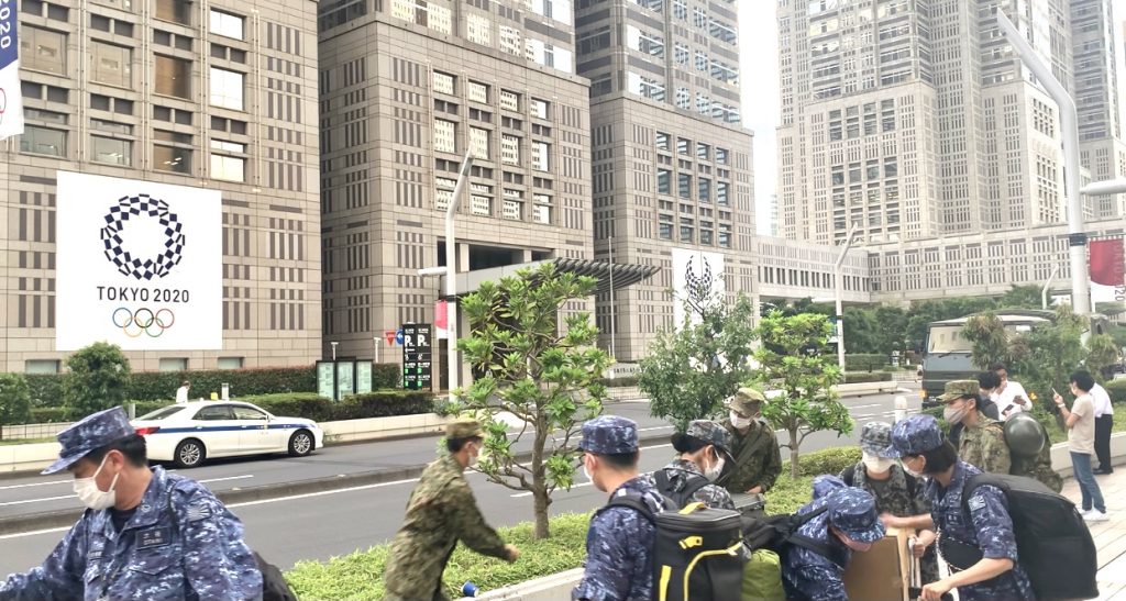 Japan Self Defense forces members accompanied Bach to the Tokyo metropolitan government building. (ANJP/ Pierre Boutier)