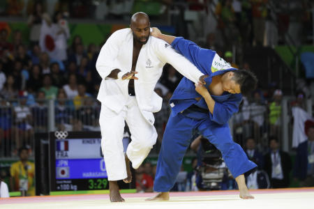 France's Teddy Riner (left) competes against Japan's Hisayoshi Harasawa for the gold medal during the men's over 100-kg judo competition at the 2016 Summer Olympics in Rio de Janeiro, Brazil. (AP/file)